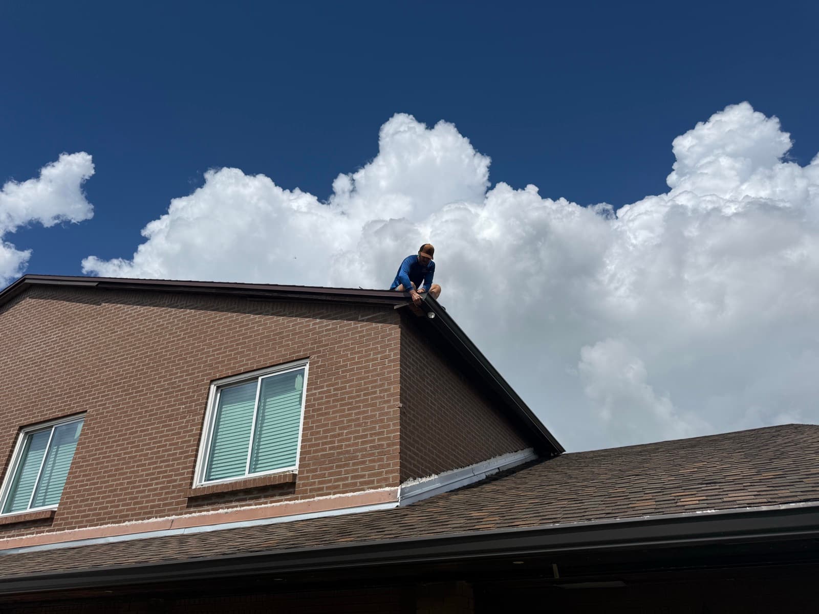 Gutter installer on roof in Southwest Florida